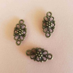 sz.metal łacznik kwiatk 1,6*0,8 cm opk.10 szt